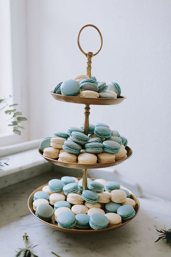 Blue macaroons presented on large stand by Thomas Steibl Photography 