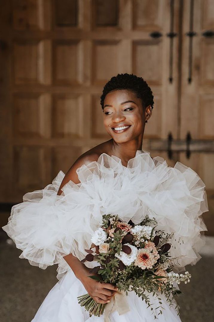 bride with afro kinky, coil wedding hair