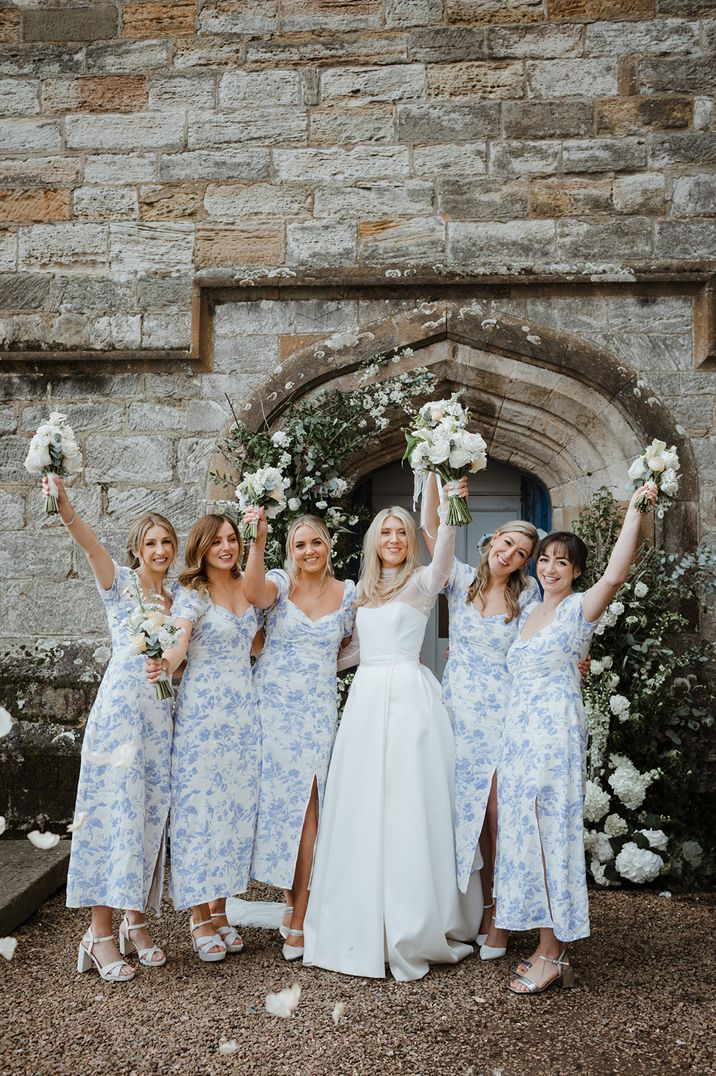 bridal-party-in-matching-bridesmaid-floral-dresses