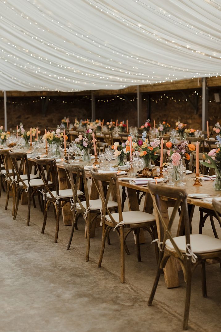 marquee-wedding-reception-with-colourful-flowers