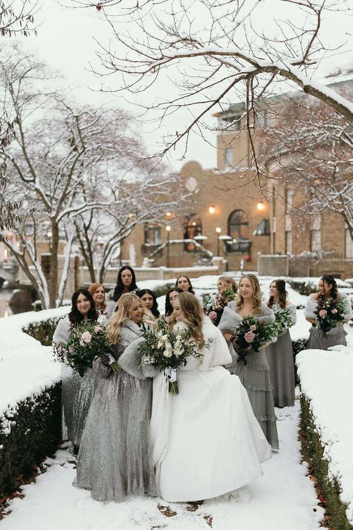 snowy-winter-wedding-with-bridesmaids-in-grey-dresses