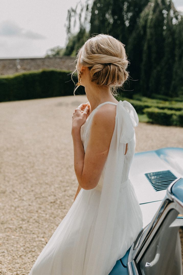 bride-wearing-hair-in-blonde-updo-at-wedding