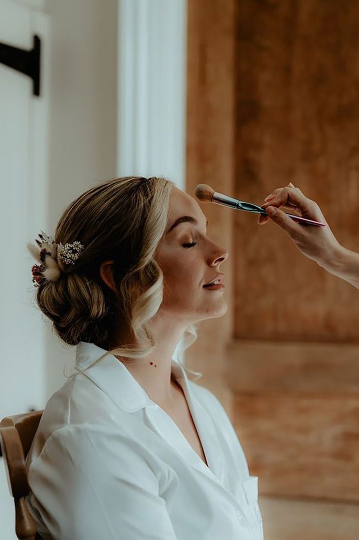 bride-gets-makeup-done-wedding-day-Patrick-Partridge-Photography