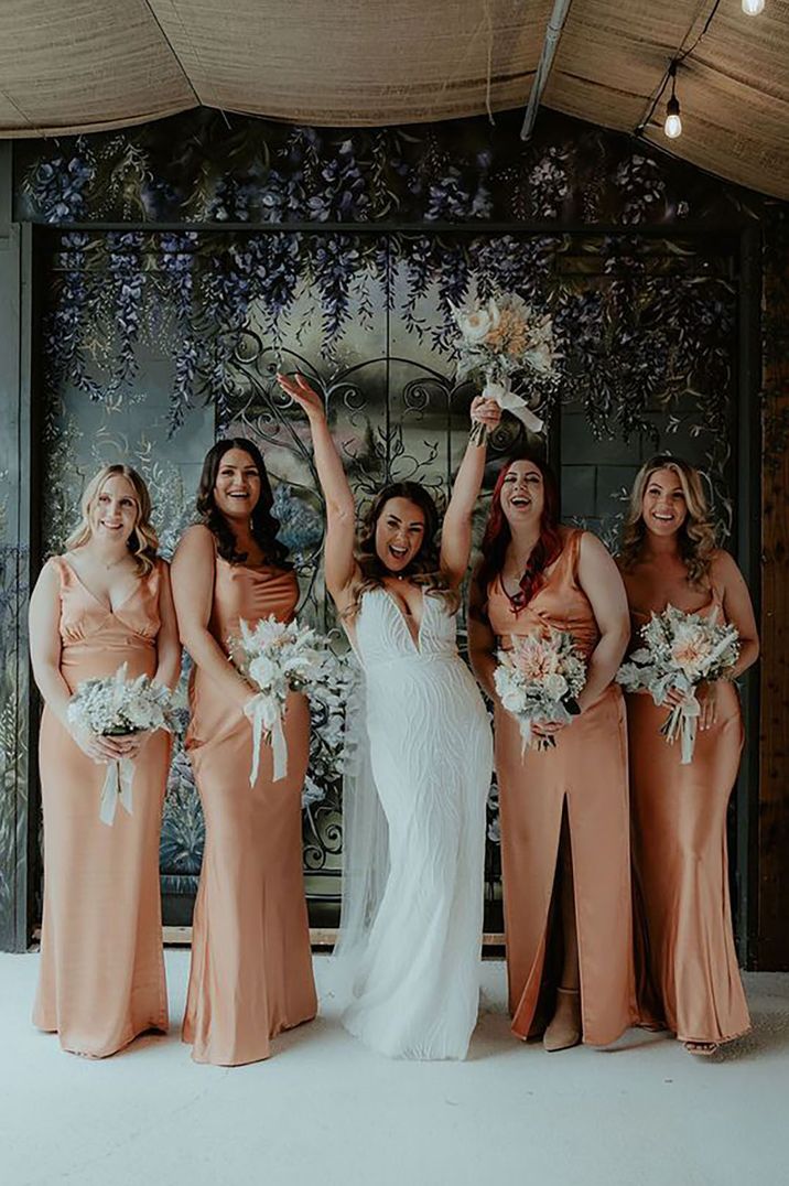 bridal-party-in-peach-bridesmaid-dresses