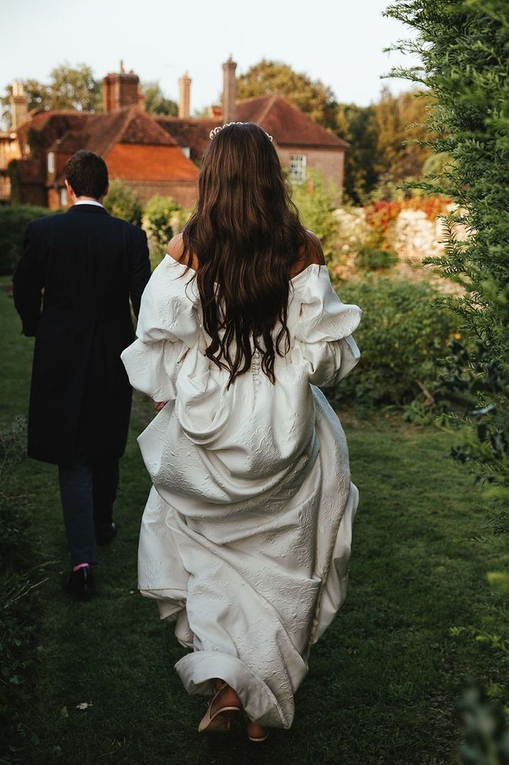 bride-wearing-long-brown-hair-styled-in-loose-curls