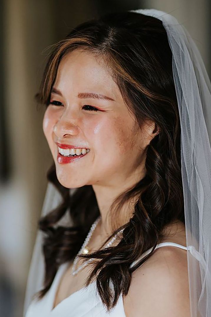 bride with glowy skin and natural makeup on wedding day