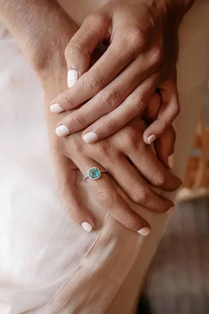 delicate green gemstone engagement ring