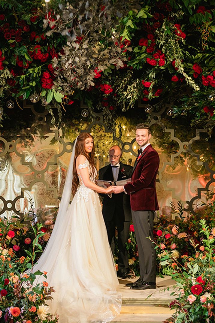 deep-red-extravagant-wedding-ceremony-flowers