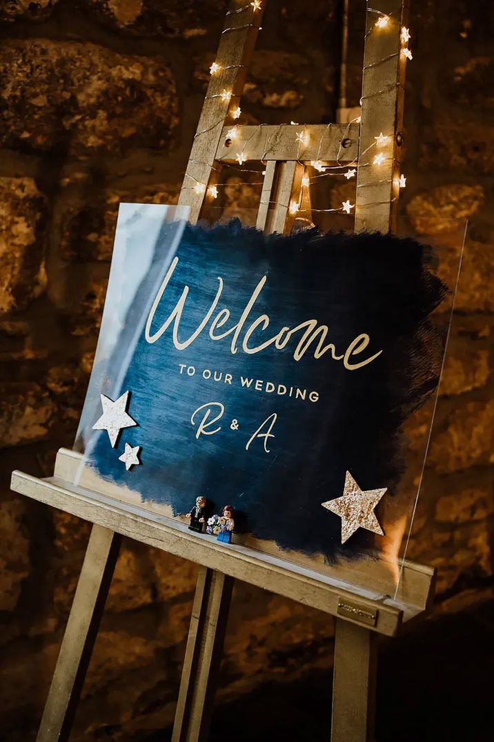 blue and gold wedding welcome sign