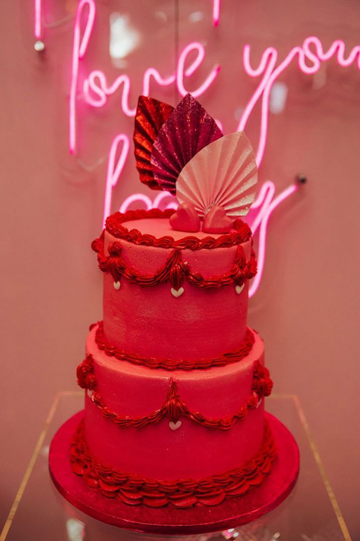 bright red and hot pink tiered wedding cake