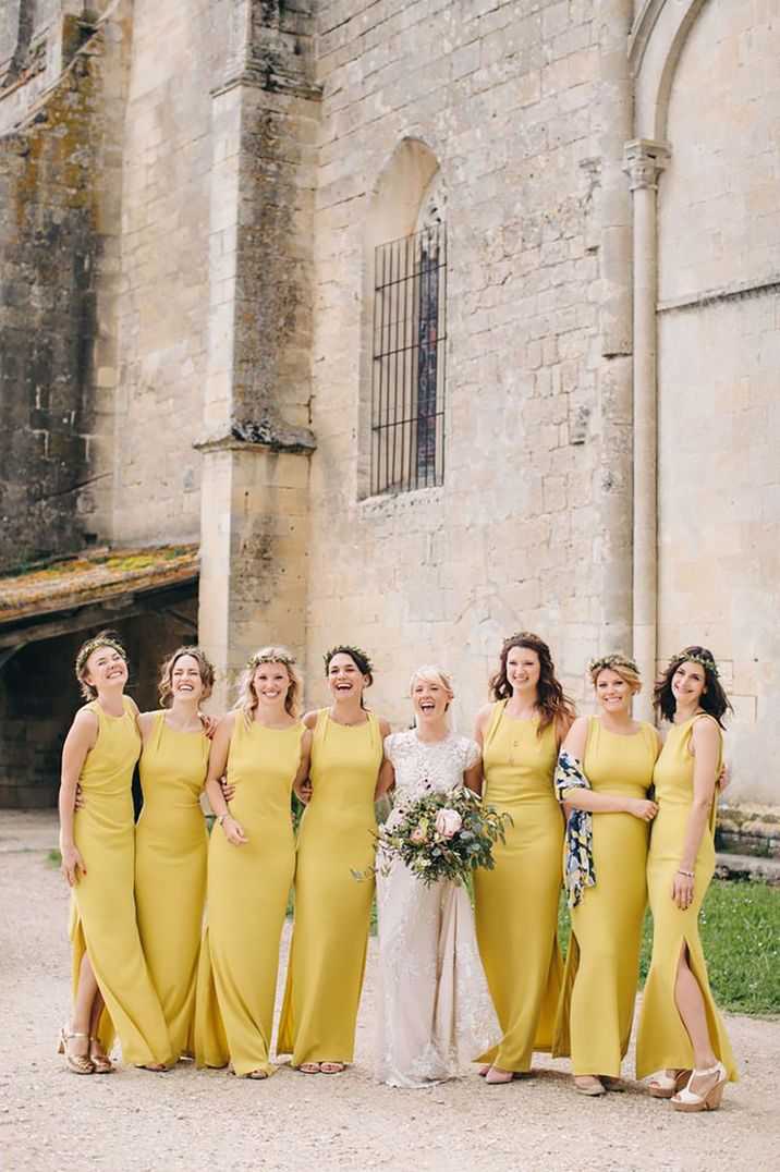 bridesmaids wearing sunflower yellow bridesmaid dresses