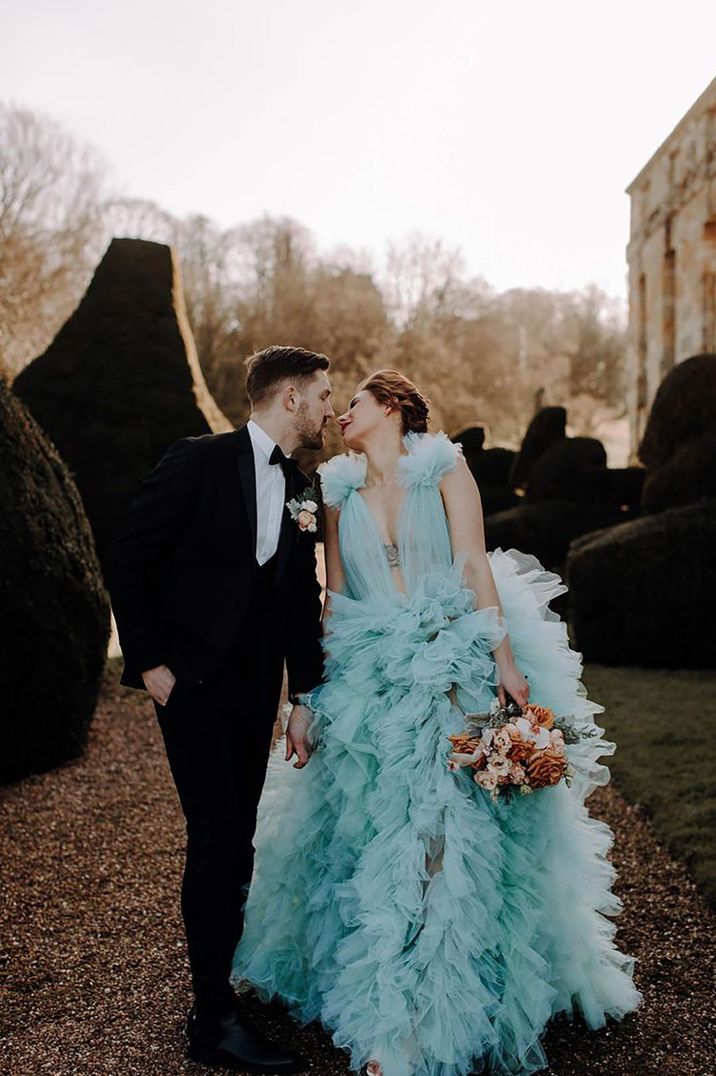 bright teal blue coloured wedding dress with tulle ruffles 