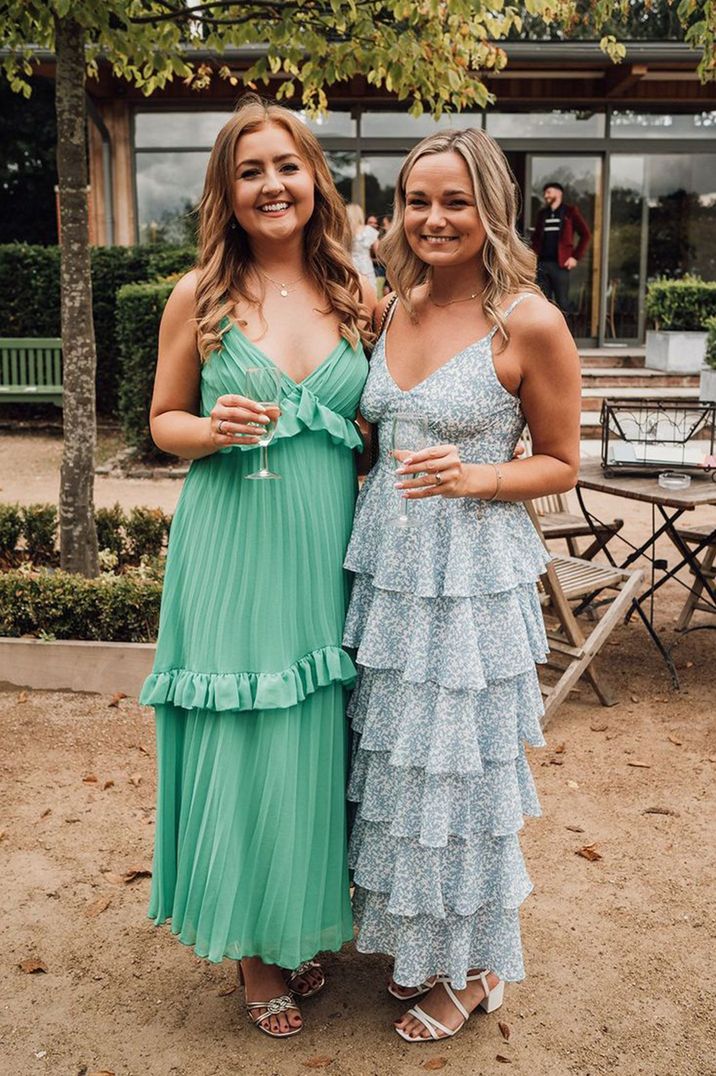 wedding-guests-wearing-blue-and-green-wedding-guest-dresses