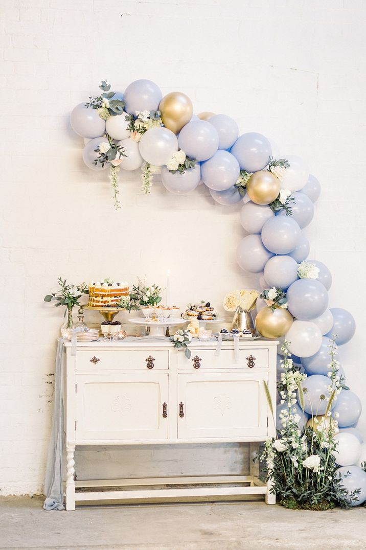 Vintage Dresser Dessert Table with Blue Balloon Arch Wedding Decor