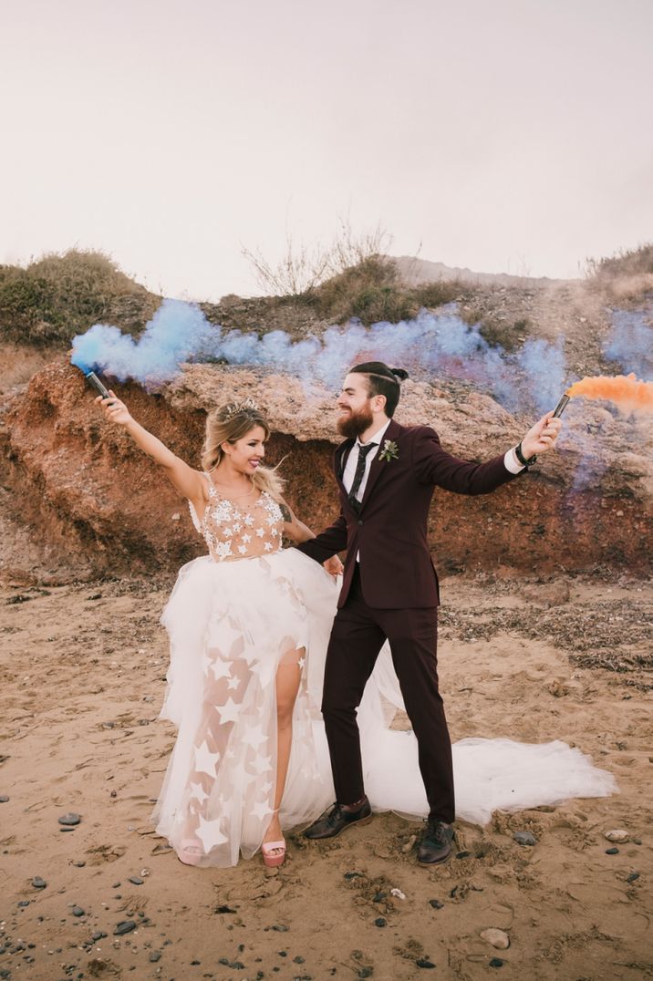 Bride and groom smoke bomb portrait