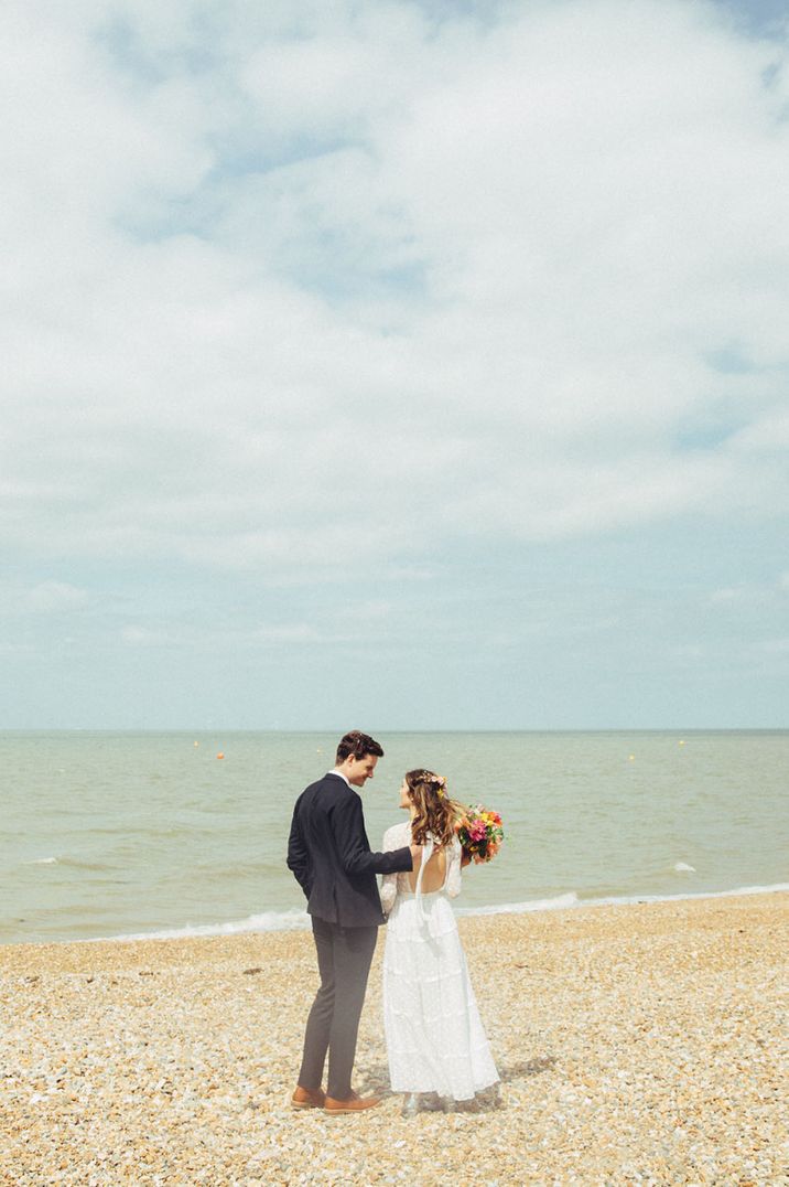 Bride and groom portrait on the beach