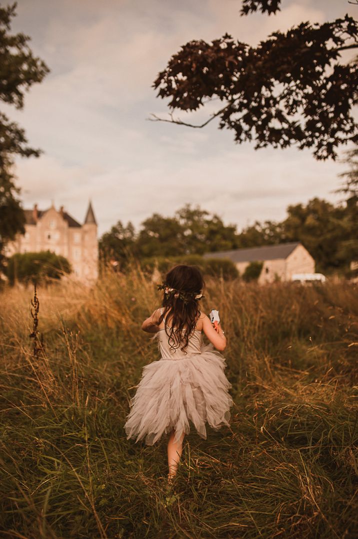 Girl in grey fairy dress with tulle skirt