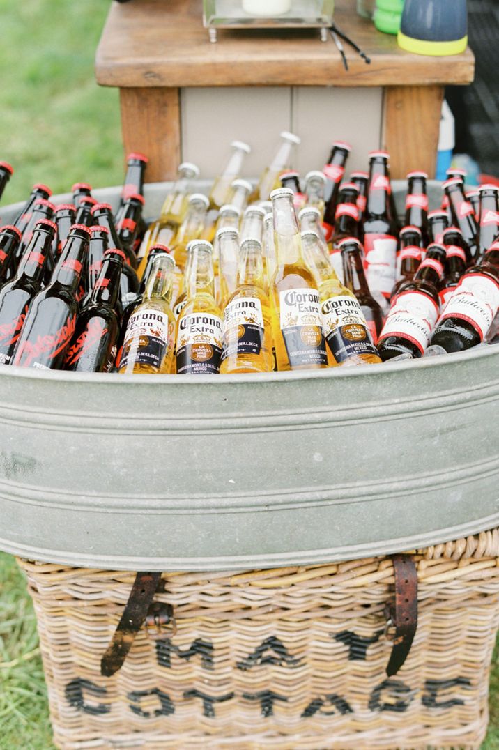 Metal trough filled with bottles of beer