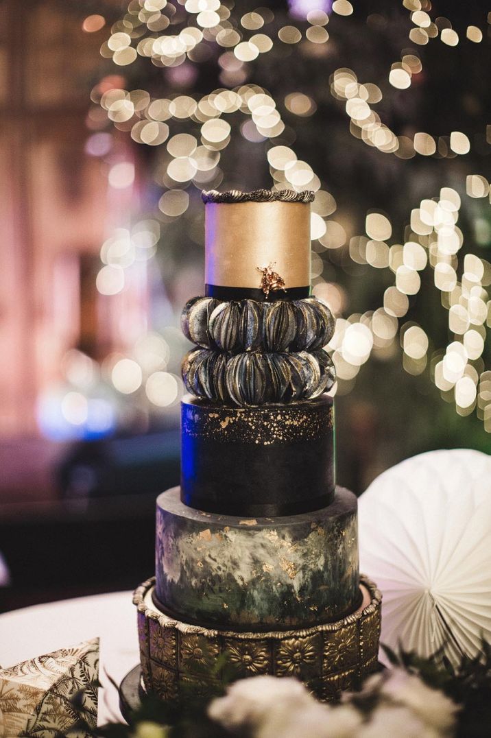 Decadent black and gold wedding cake