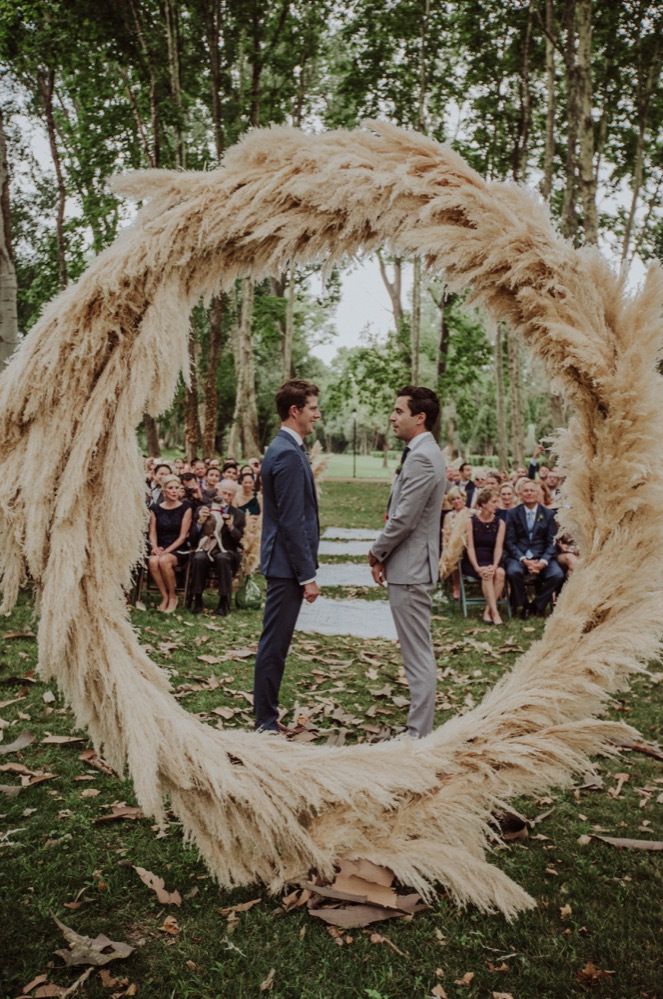 Gay wedding with pampas grass moo gate