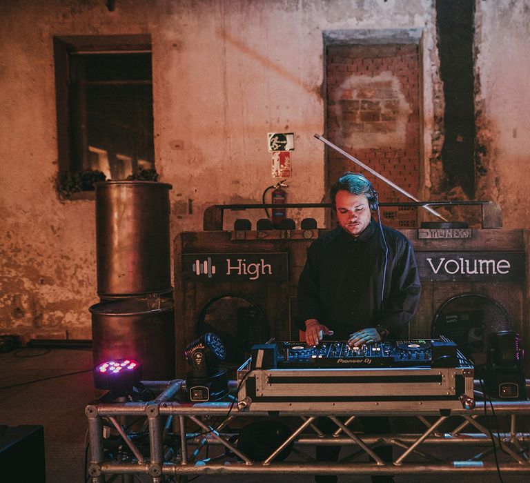 DJ booth with retro tape industrial chic wedding decor