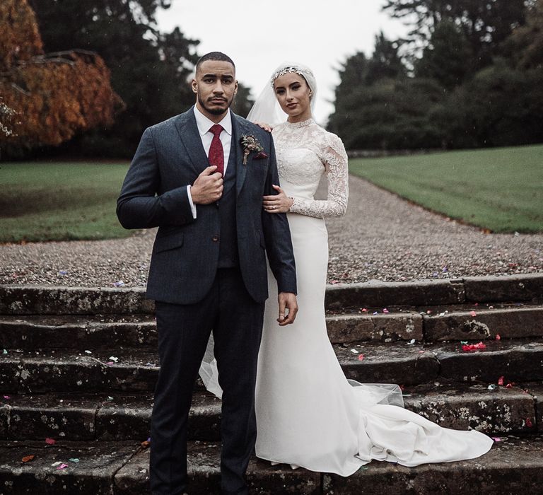 Stylish bride and groom at Islamic wedding 