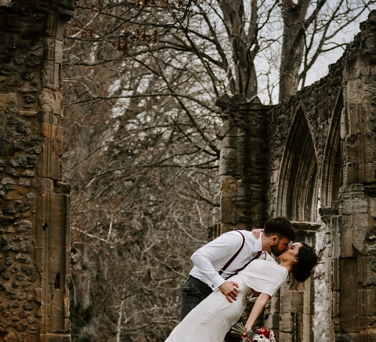 Bride and Groom dancing in stone ruins