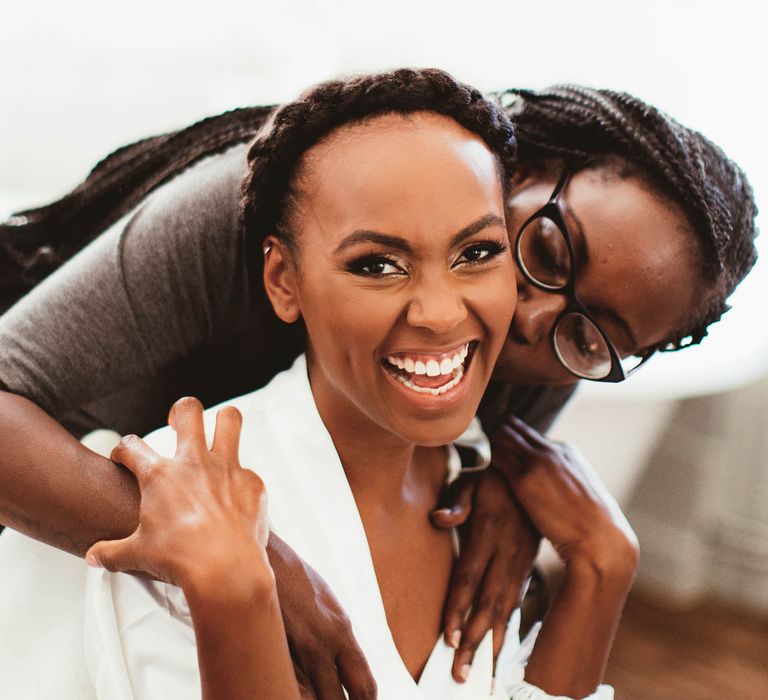 Black bride with braided crown, shimmering eyeshadow and false lashes | Maryanne Weddings