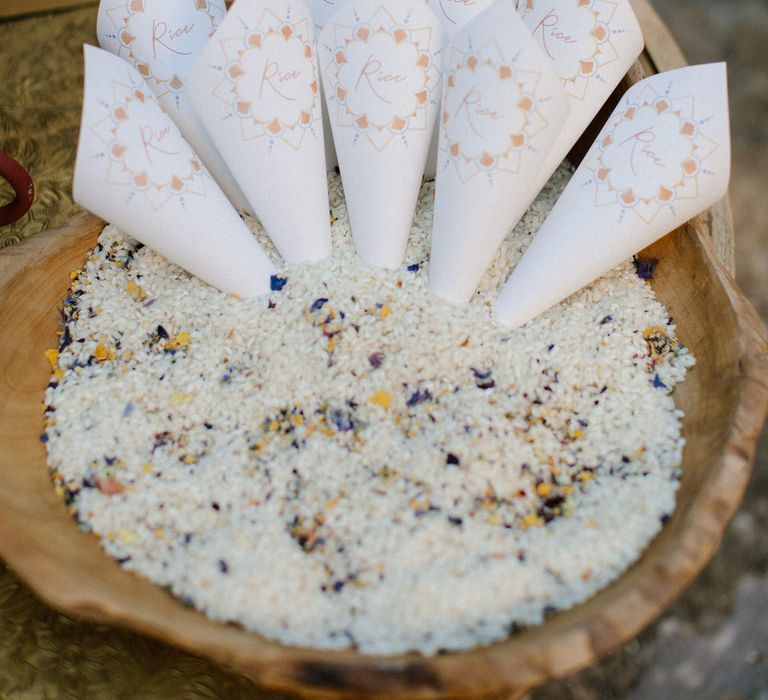 Confetti cones in a bowl of rice ready for the guests to take