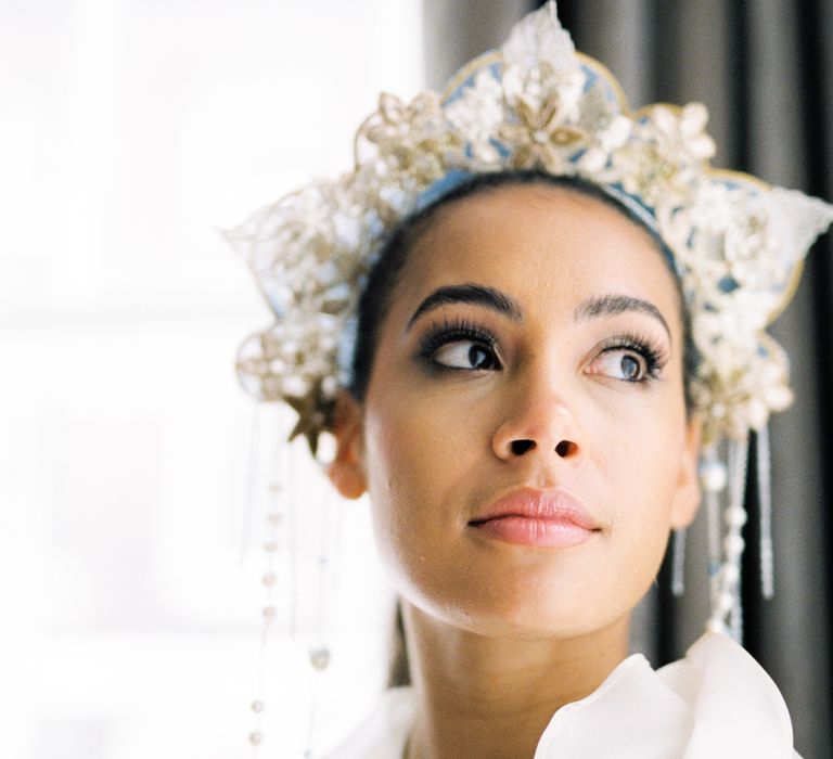 Bride wears floral golden crown