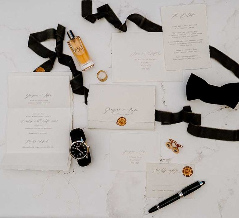 Classic wedding stationery suite and grooms accessories 