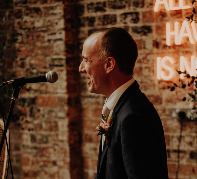 Wedding speech at industrial venue