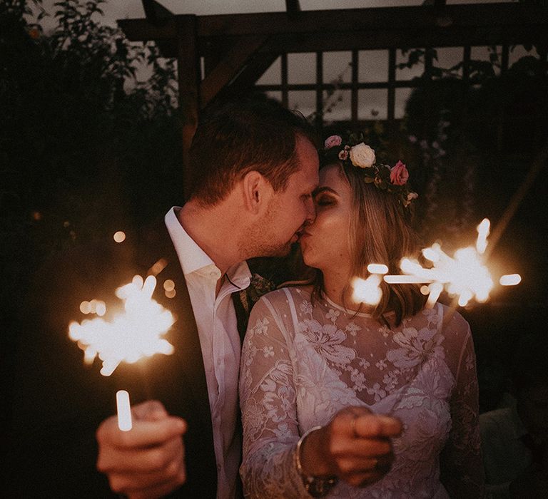 Bride and groom sparkler exit at back garden wedding 