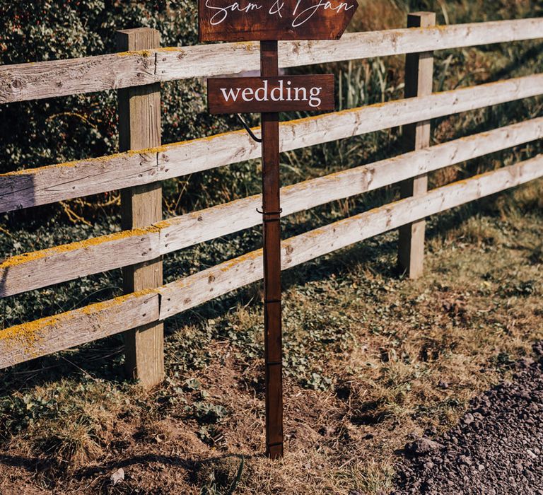 Wooden signs at Unplugged ceremony at Elmley Nature Reserve