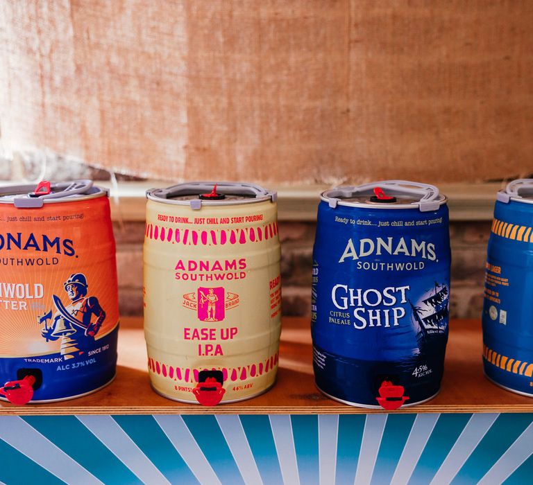 Four different mini kegs of Adnams ale for festival style wedding in Essex