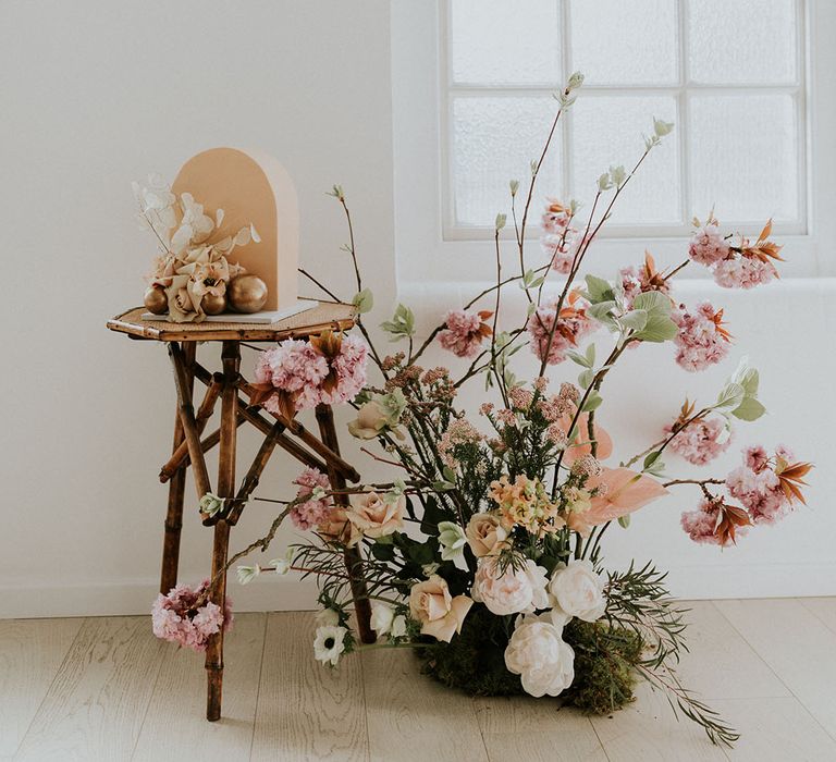 Blush pinks, peaches and fair green flower arrangement 