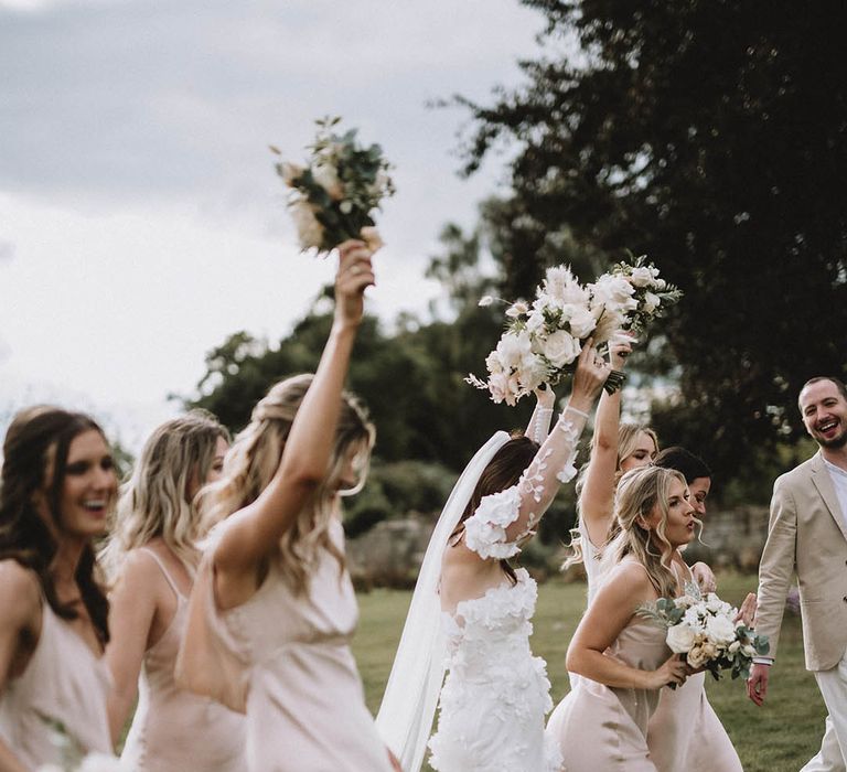 Light pink satin bridesmaid dresses for country house wedding