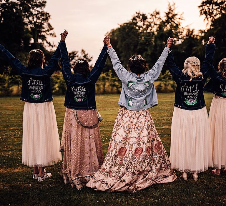 Bride & her bridesmaids wear personalised denim jackets 