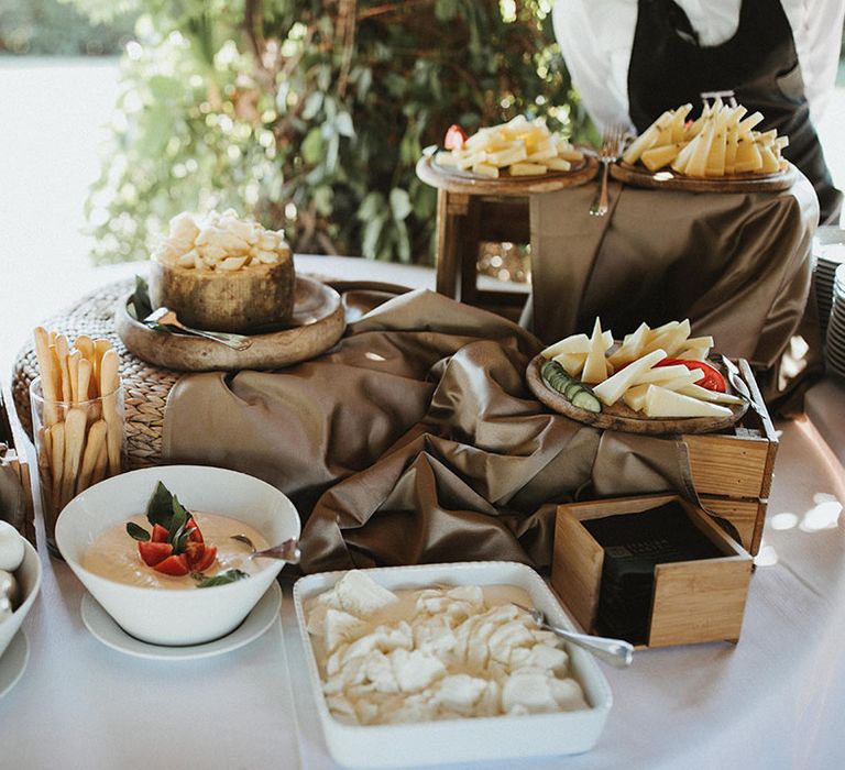 Buffet styled catering during outdoor Tuscan wedding reception