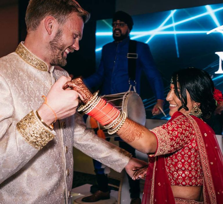 Bride and groom dancing to live wedding music entertainment Templars Barn Indian-English fusion interfaith wedding