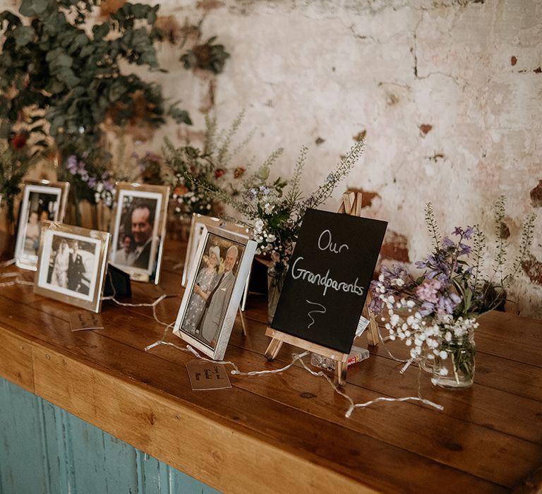 photo corner with portraits of grandparents in frames 