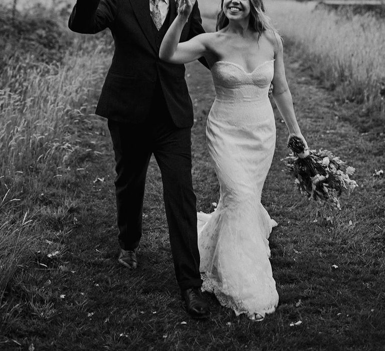 The Cherry Barn in Rye wedding with bride and groom posing couple portrait 