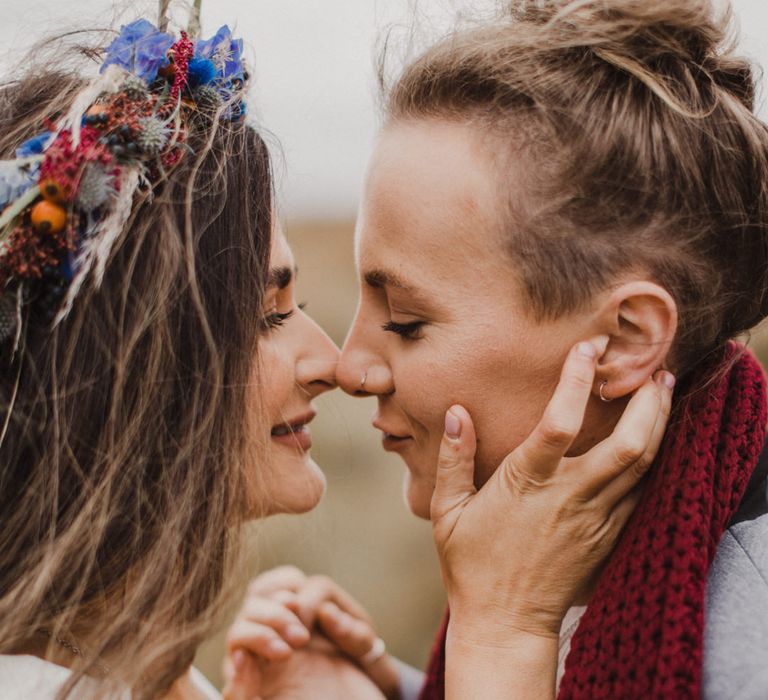 The brides share a kiss at their Peak District Elopement