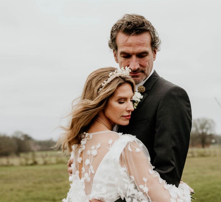 Bride and groom in the fields of High Billinghurst Farm