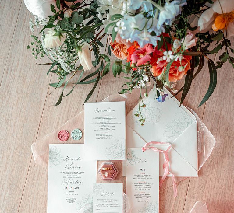 Wedding stationery suite with floral design and wax seals 