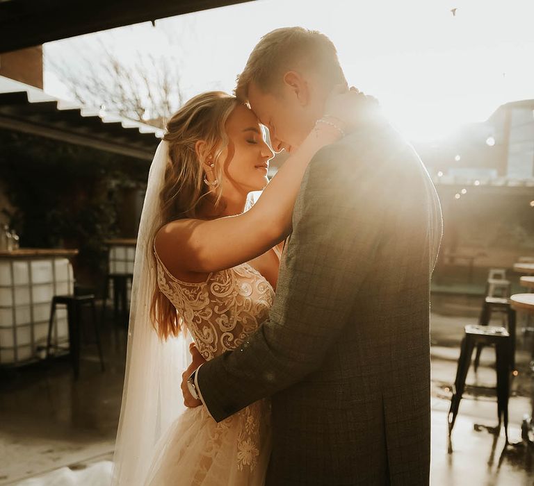 Bride and groom at industrial wedding venue