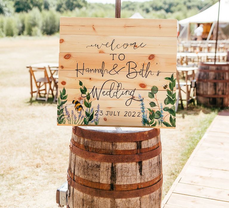 Handpainted welcome wedding sign with bees and flowers