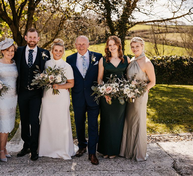 Bride and groom with their wedding guests