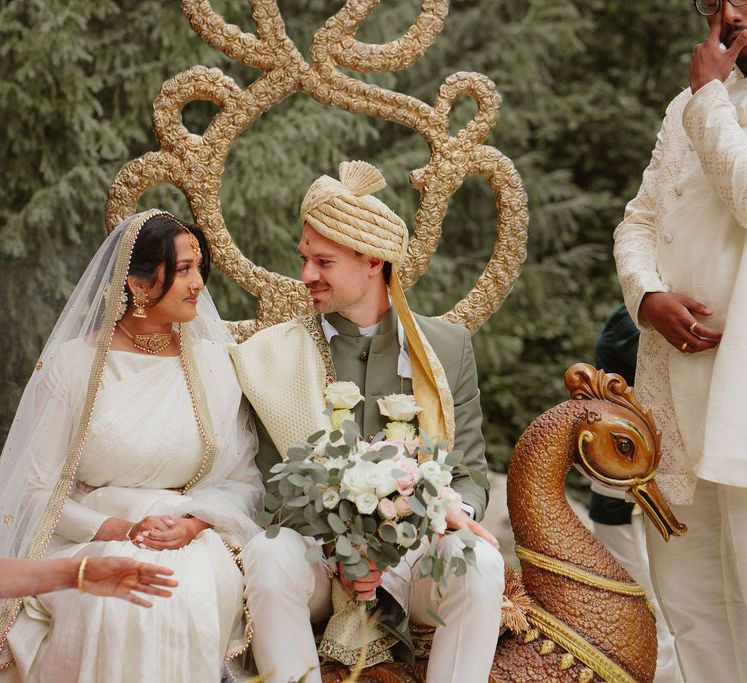 Hindu wedding ceremony with bride in a Lehenga and groom in a Sherwani