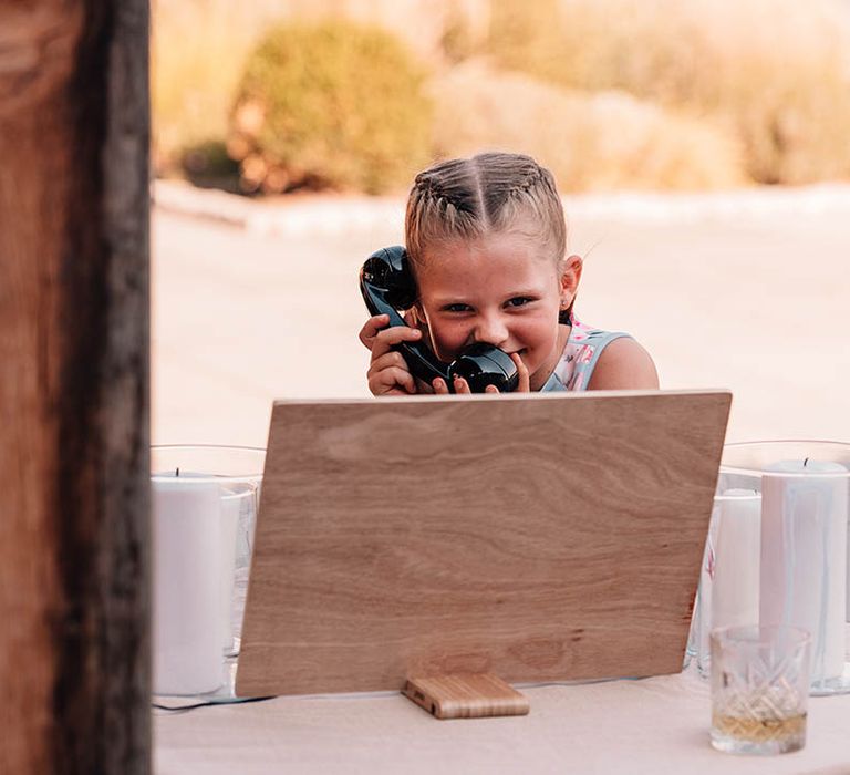 A little girl leaves a message for the happy couple on the audio guest book by Audio Guest Book